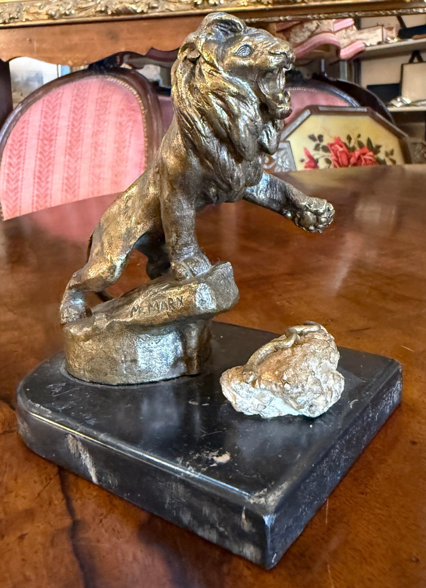 Sculpture bronze lion Peugeot tuant un serpent par  Maurice MARX