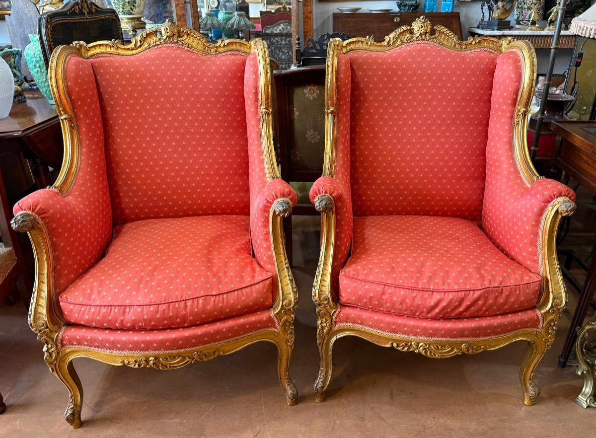 Importante paire de bergères à oreilles en bois doré style Louis XV époque Napoléon III 