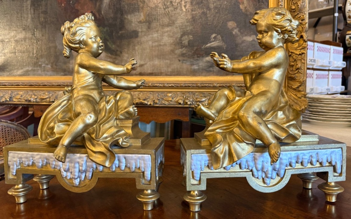 Pair Of Neoclassical Louis XVI Andirons With Putti In Gilded And Silver-plated Bronze, 19th Century