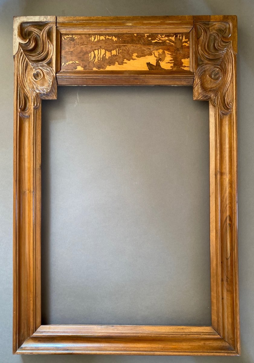 Art Nouveau Frame In Carved Walnut And Marquetry Decor. Late 19th Century.