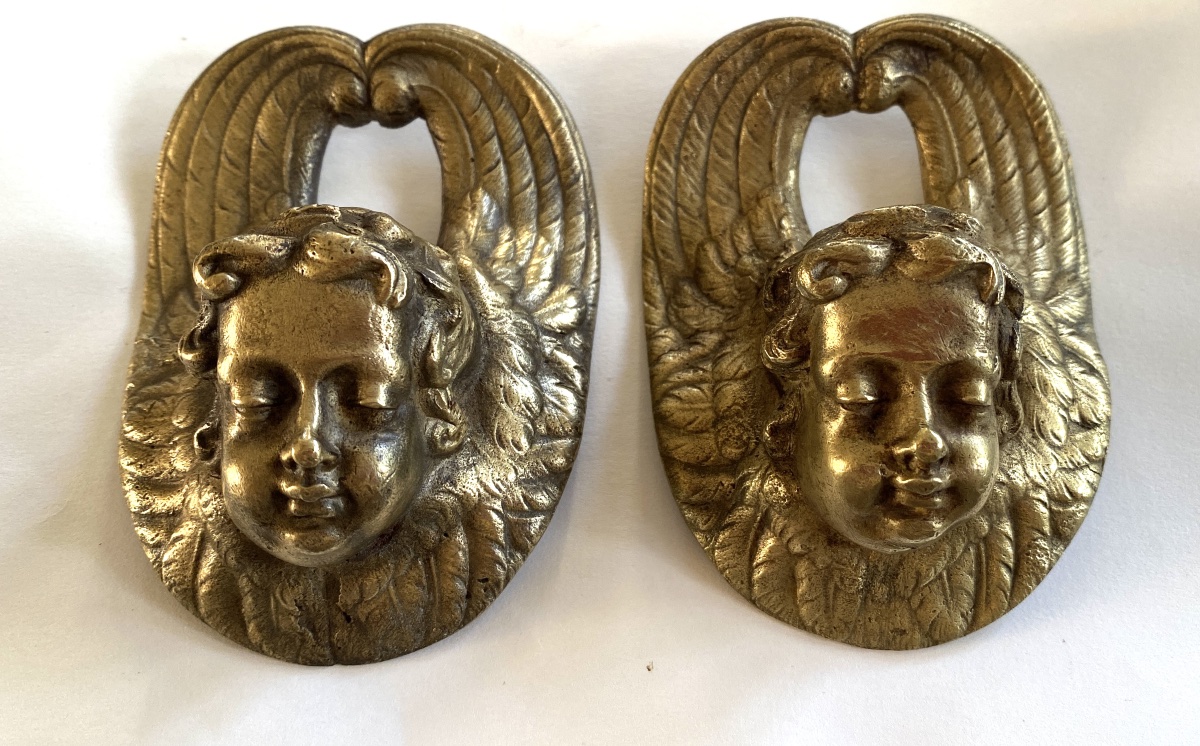 Cherub Heads. Two 19th Century Ornamental Bronzes.