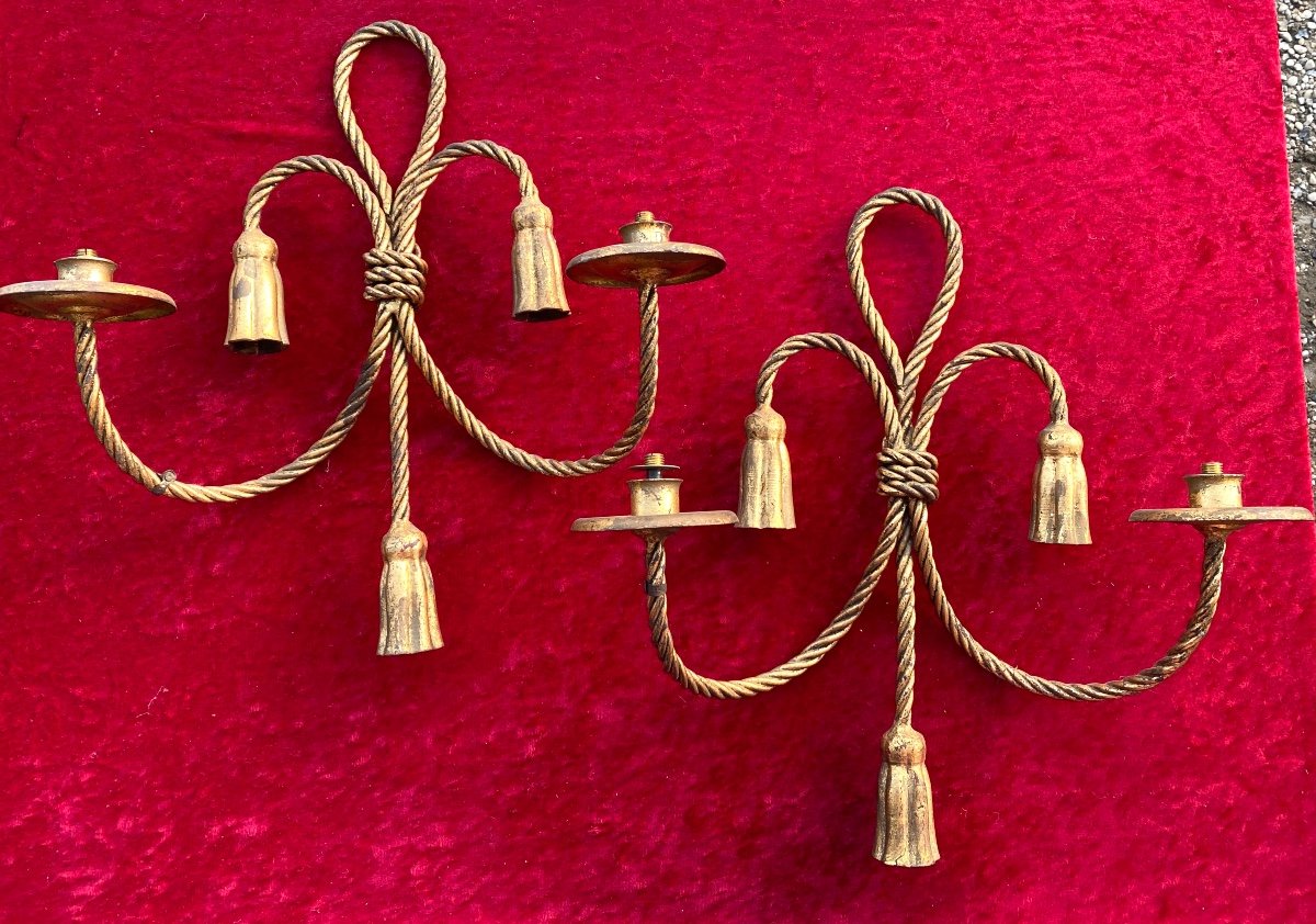 Pair Of Twisted And Gilded Metal Wall Lights. Italy, Mid-20th Century. Cord And Tassels. 