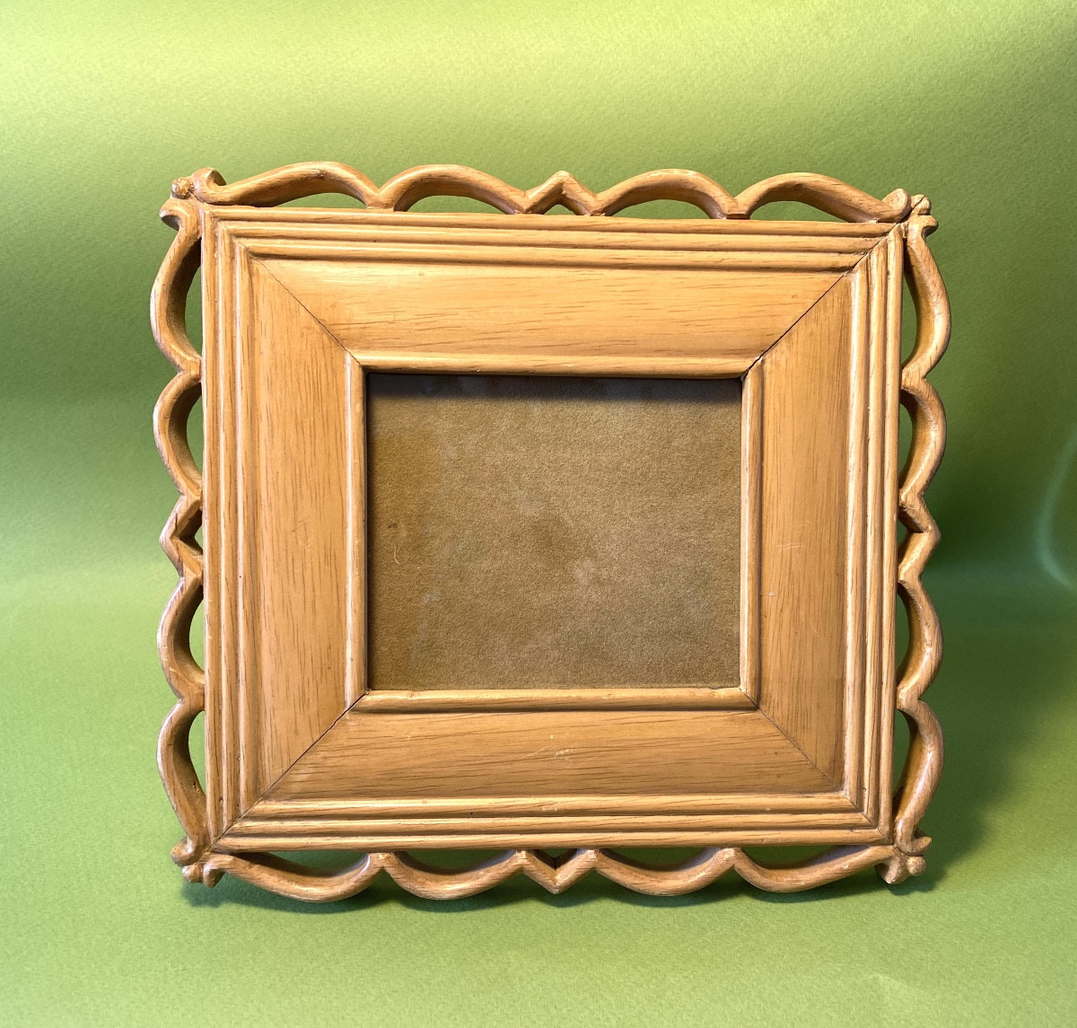 Early 20th  Carved Wooden Frame. Openwork Decoration Of Braces. 