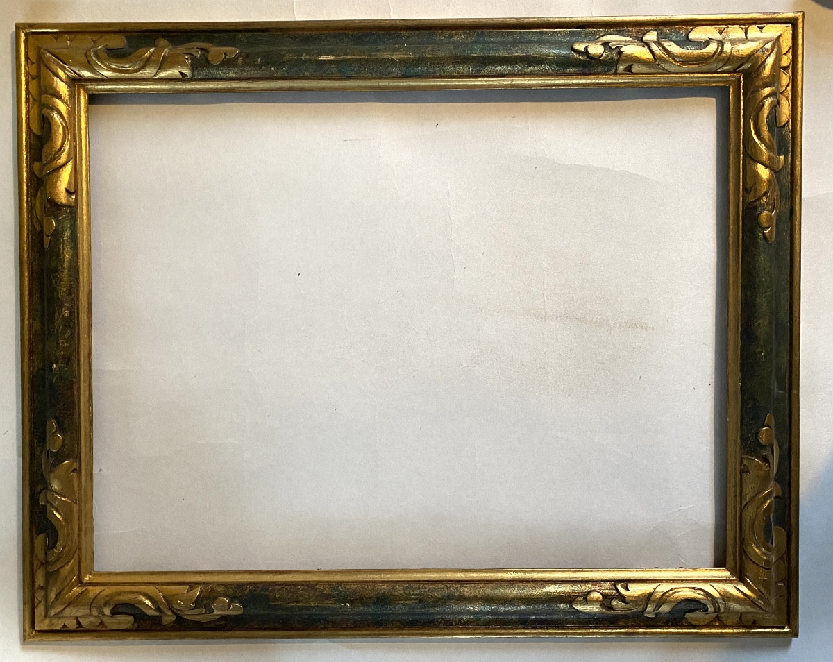 Cadre en bois style florentin milieu XXème. Patine verte et or. Coins Sculptés et dorés. 