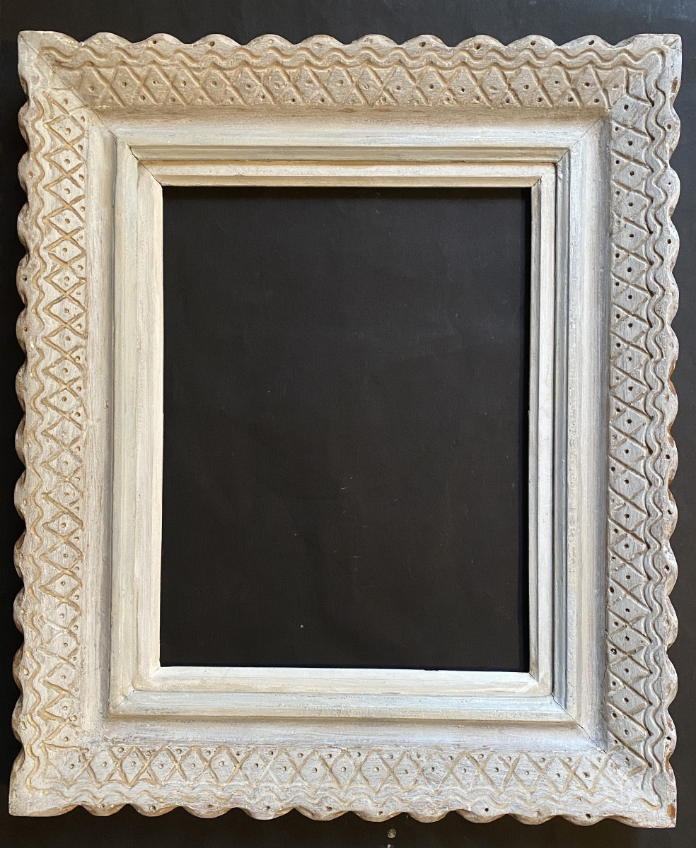 Emile Bouche. Cadre en bois massif sculpté et patiné. Années 40.