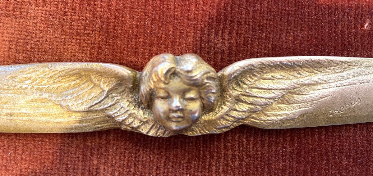 G. A. Chenus. Coupe papier en bronze fin XIXème/ début XXème. Tête d’angelot ailée. -photo-1