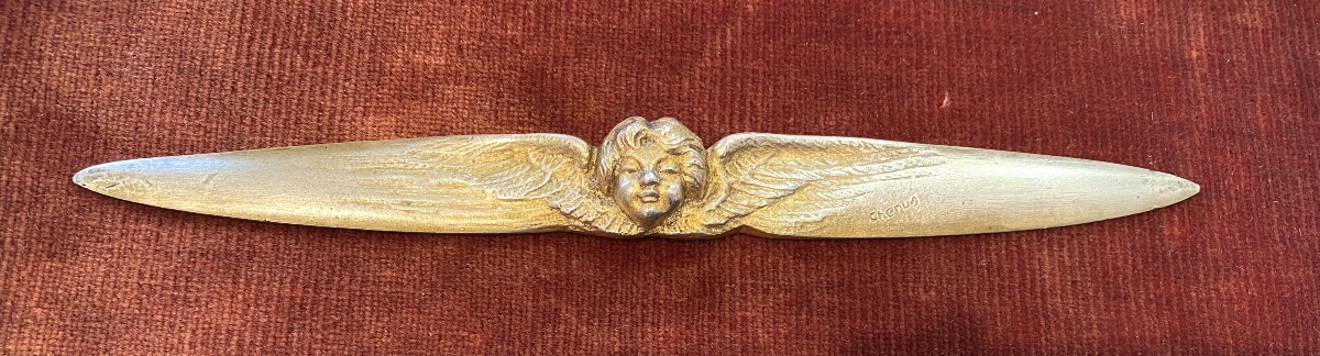 G. A. Chenus. Coupe papier en bronze fin XIXème/ début XXème. Tête d’angelot ailée. 