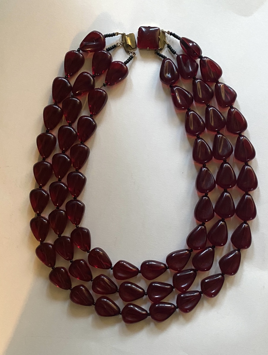 A 1950s Necklace With Three Rows Of Oval Red Lucite Beads. -photo-2