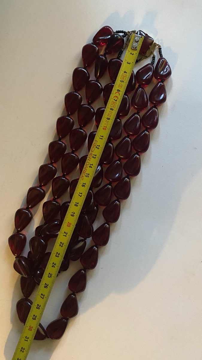 A 1950s Necklace With Three Rows Of Oval Red Lucite Beads. -photo-4