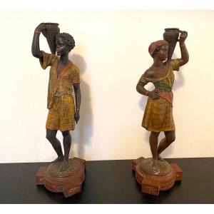 Pair Of Candlesticks In Polychrome Spelter. XIXth. Nubian Couple.
