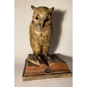 Owl Resting On A Book. Patinated Plaster. Mid 20th Century. Glass Eyes.