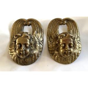 Cherub Heads. Two 19th Century Ornamental Bronzes.