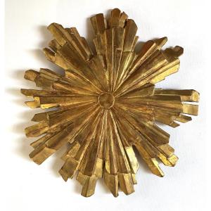 Soleil en bois sculpté et doré début XIXème. 