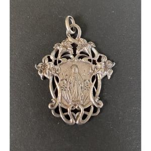 Art Nouveau Religious Medal In Silver. Virgin Mary And Lilies. 1905. 
