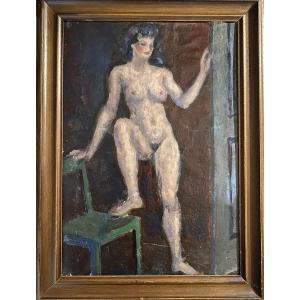 “Le modèle dans l’atelier”. Nu féminin. Huile sur toile marouflée sur carton. Milieu XXème. 