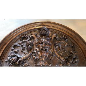 Large 19th Carved Wood Pediment. Decorated With Devil's Head, Ribbons And Horns Of Plenty.