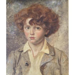 Portrait d’un jeune enfant aux cheveux roux. Huile sur toile début XXème.