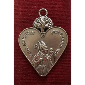 Médaille religieuse en argent massif XIXème. Saint Augustin et Précieux sang de Jésus.