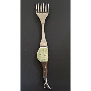 19th-century Serving Fork. Folk Art. Steel And Horn. Depicts A Woman's Torso.