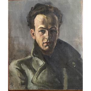 Portrait d’un jeune homme. Huile sur toile. Ecole française milieu XXème. 