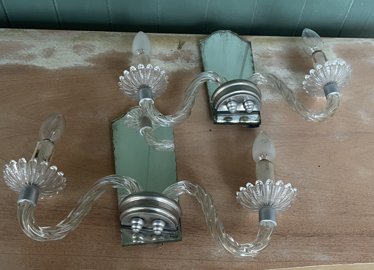 4 Twisted Glass Sconces On A Mirror Background-photo-6