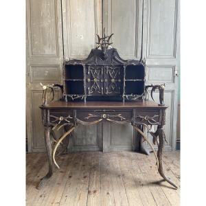 Bureau en bois de cerf , chêne et tilleul sculpté 