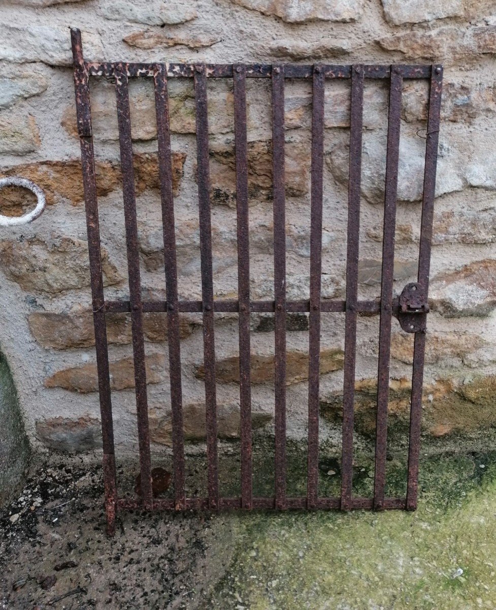 Very Old Grid-gate Of Well And Fountain In Wrought Iron And Riveted.