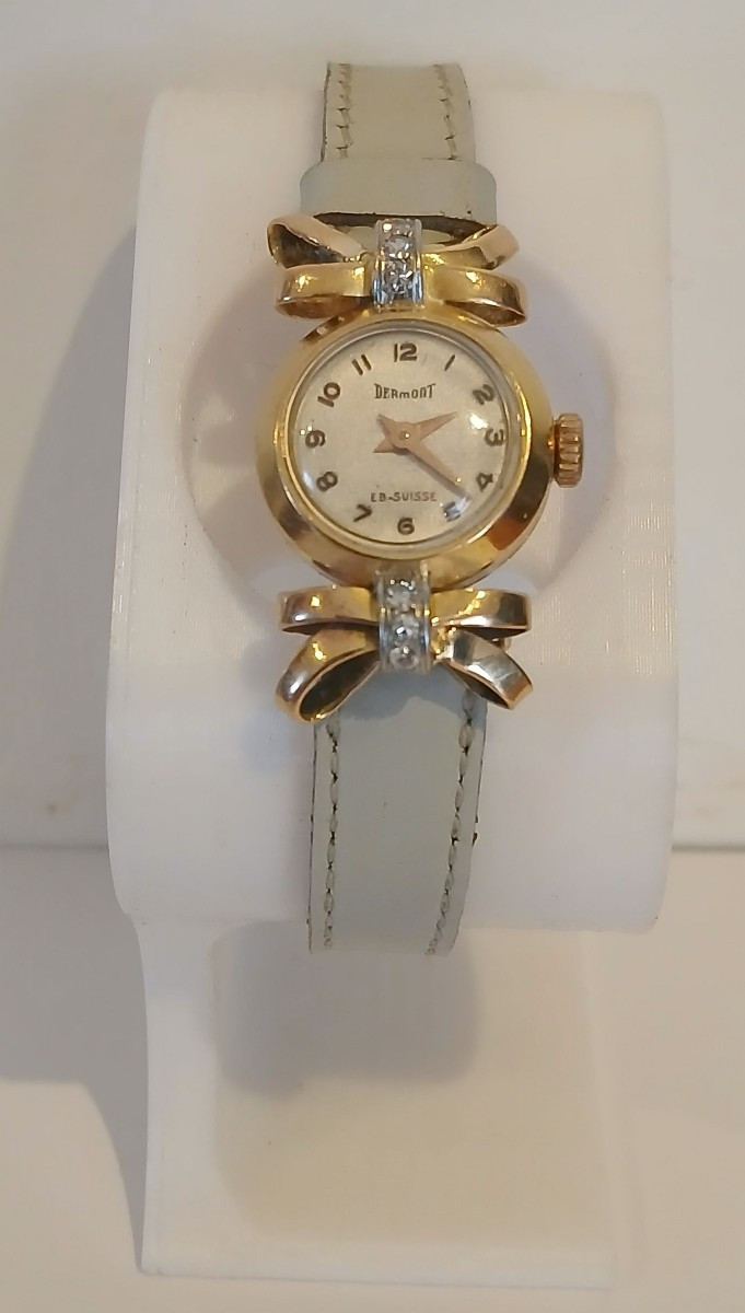 Montre de femme, en or et diamants. Dermont. Suisse. 