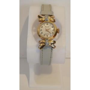 Montre en or et diamants  de dame. Dermont. Suisse. 