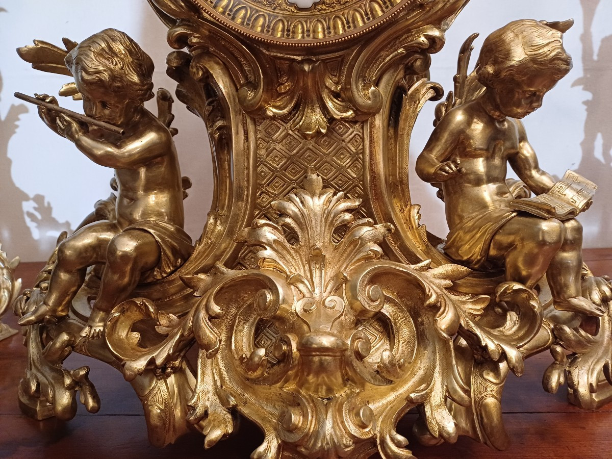 Garniture  de cheminee, ( pendule  et  candélabres) bronze  style rocaille circa 1900-photo-4