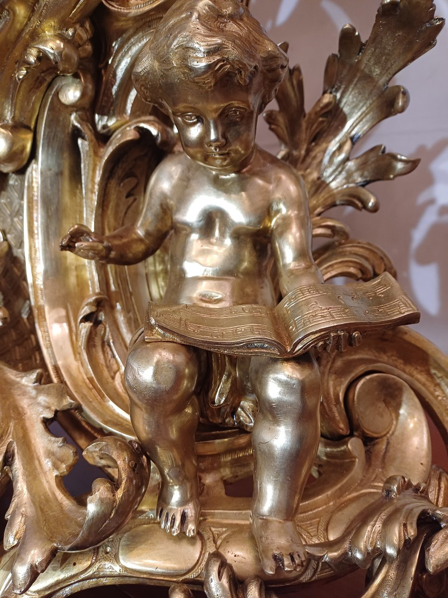 Garniture  de cheminee, ( pendule  et  candélabres) bronze  style rocaille circa 1900-photo-3