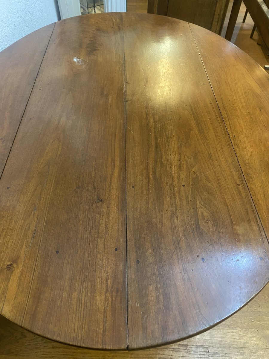 Table ovale à 6 pieds en noyer, 3 allonges, 12 personnes.-photo-4