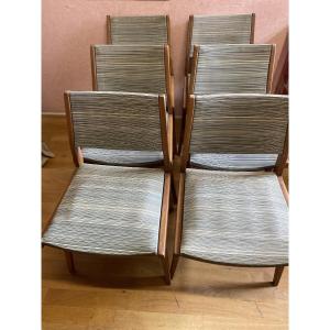 Série de 6 chaises des années 60. Tissu plastifié en parfait état.