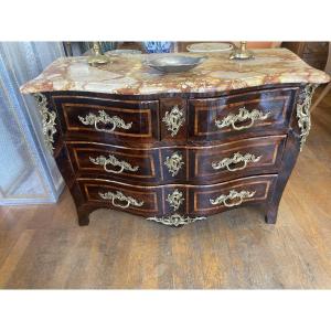 An 18th-century Louis XV Chest Of Drawers, Made Of Veneered Wood.