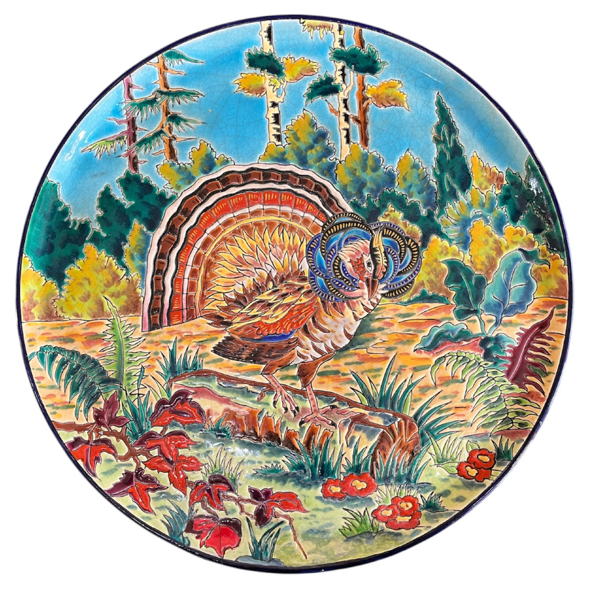 Plat en Émaux de Longwy à décor de paon