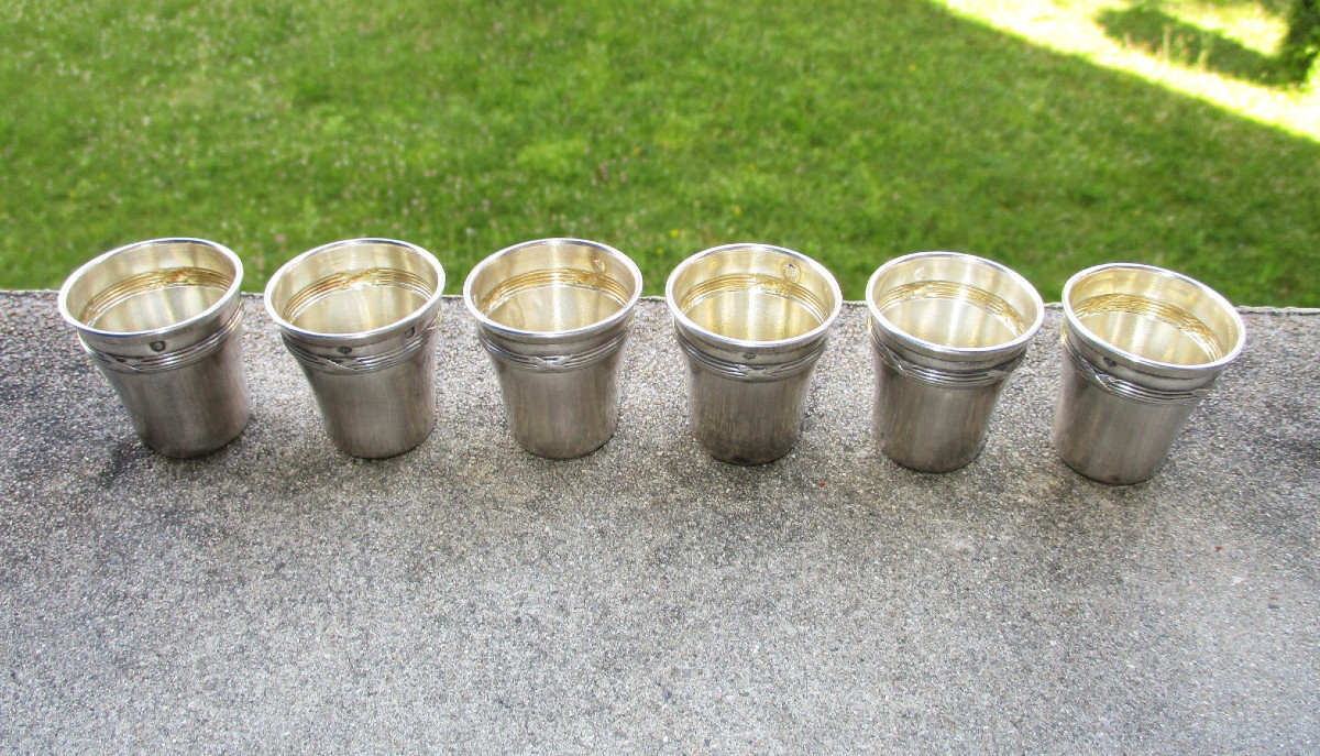 Six petits gobelets à liqueur en argent massif et vermeil, poinçon Minerve, style Louis XVI