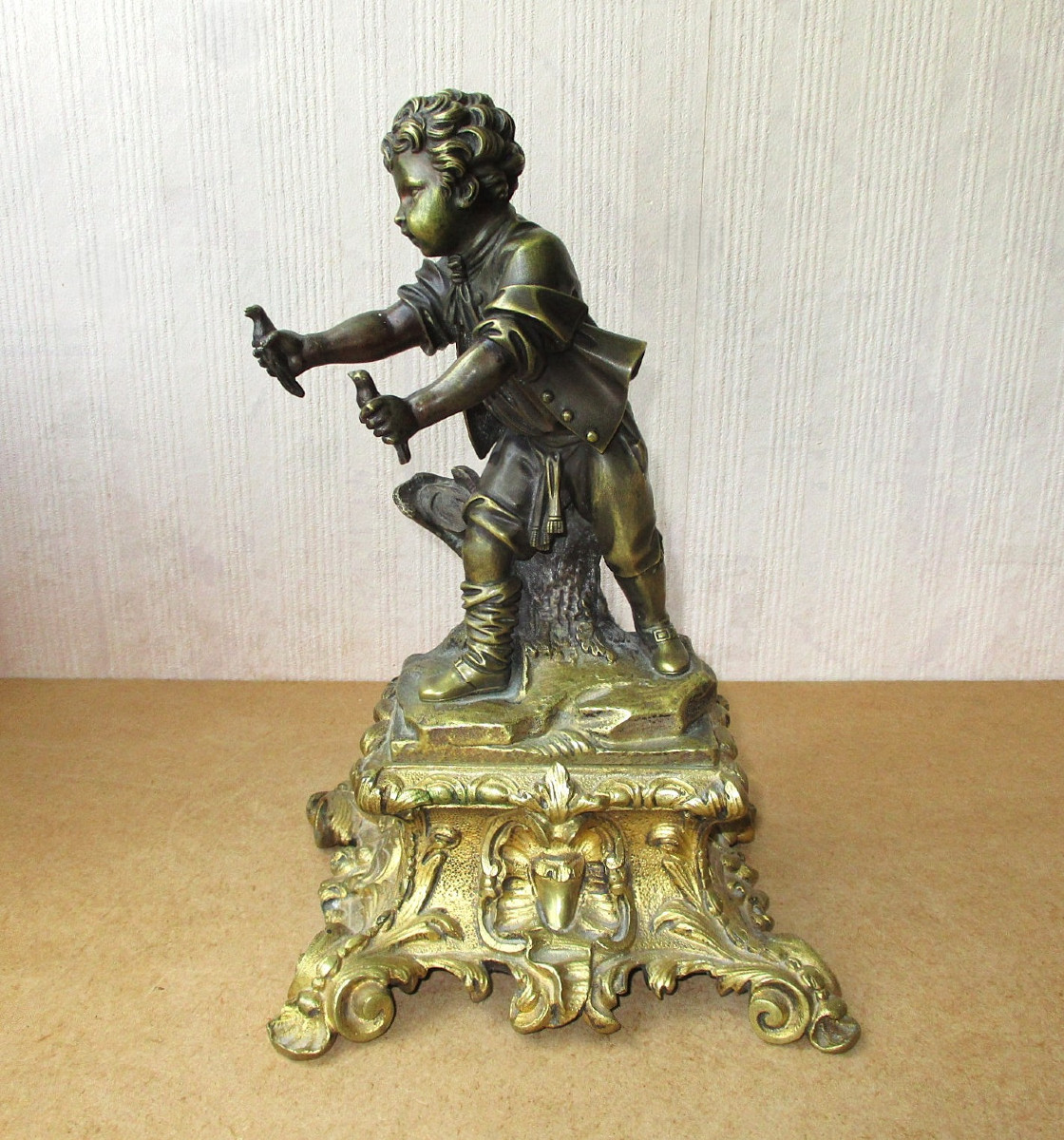 Beautiful 19th-century Bronze Sculpture Of A Boy Child With Birds On A Pedestal. Height: 28 Cm.