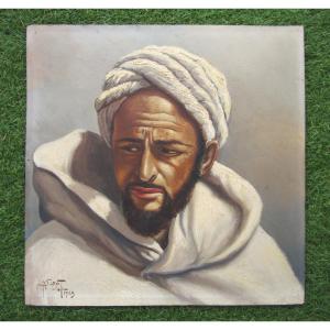 Tableau orientaliste homme au turban, huile sur bois signée et datée en 1943. Vendu sans cadre.