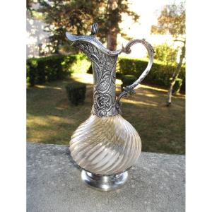 Belle aiguière XIXe style Louis XV rocaille, en cristal torsadé et monture en argent massif.