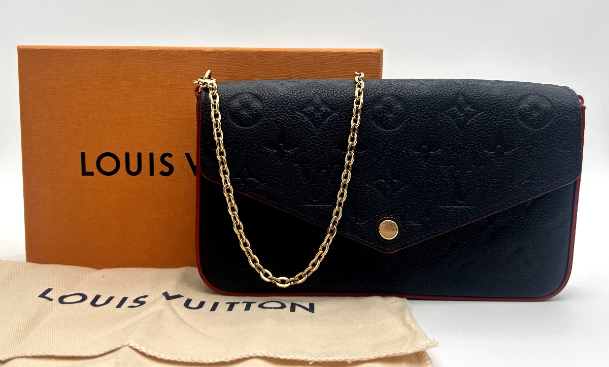 Félicie Monogram Empreinte Leather Clutch – Navy Blue