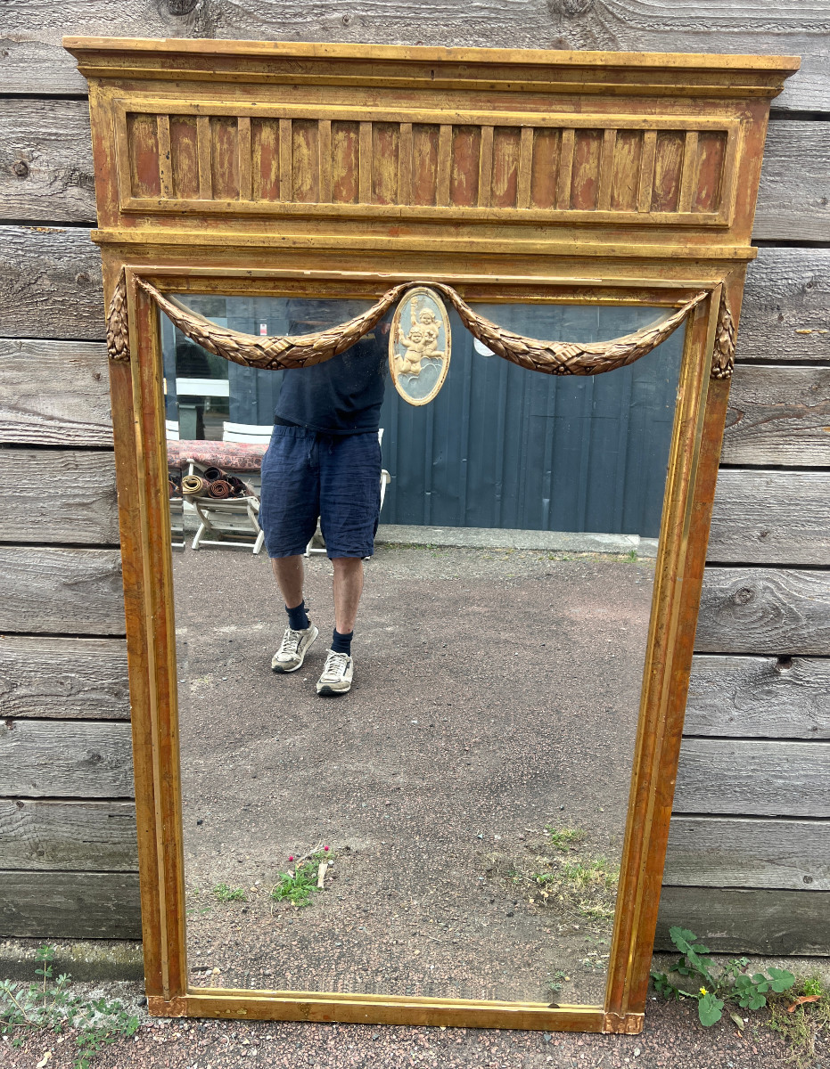Gilded Mirror With Garlands And Putti. 20th Century