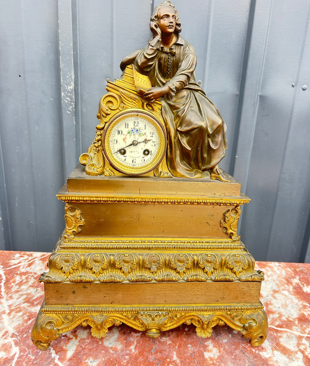 Pendule en bronze à l'écrivain , Epoque Louis Philippe