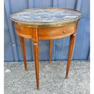 Table bouillotte en acajou, dessus de marbre gris style Louis XVI