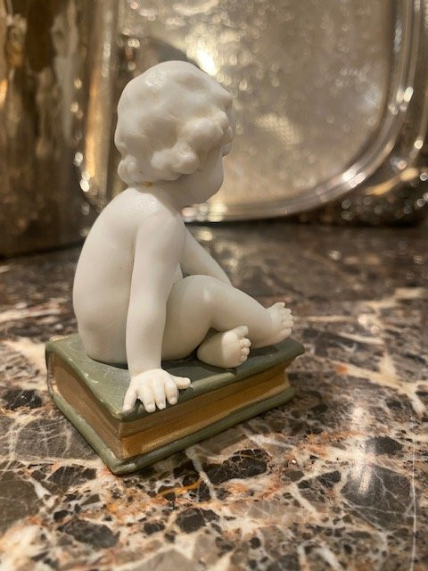 Müller Manufacture Biscuit Depicting A Little Boy Sitting On A Book.-photo-2