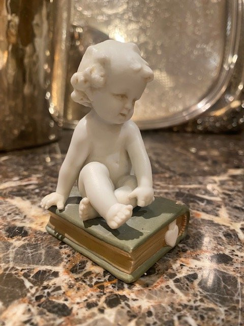 Müller Manufacture Biscuit Depicting A Little Boy Sitting On A Book.-photo-4