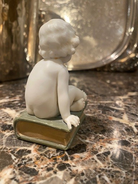 Müller Manufacture Biscuit Depicting A Little Boy Sitting On A Book.-photo-6