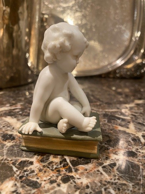 Müller Manufacture Biscuit Depicting A Little Boy Sitting On A Book.-photo-7