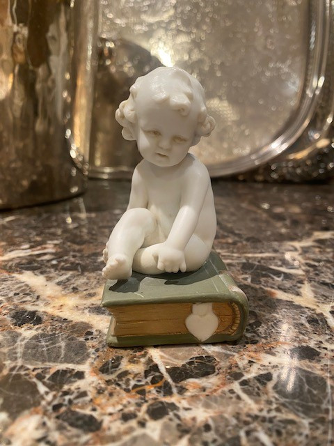 Müller Manufacture Biscuit Depicting A Little Boy Sitting On A Book.