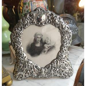 Cadre en argent repoussé 20e