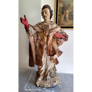 Cardinal en bois sculpté 17e
